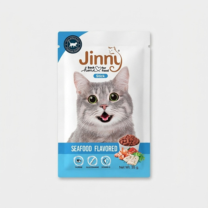 غذای تشویقی گربه جینی مدل seafood flavored وزن 35گرم