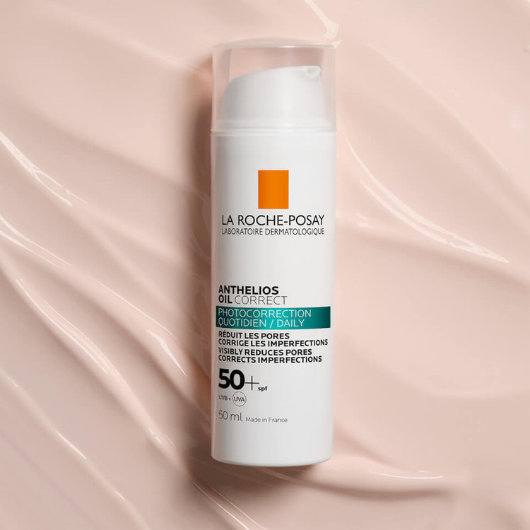 کرم ضد آفتاب بدون رنگ لاروش پوزای SPF 50 مدل ANTHELIOS OIL CORRECT مناسب پوستهای چرب و مختلط حجم 50 میلیلیتر